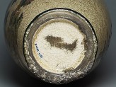 Detail of Satsuma vase with birds and flowers (EA1956.2017.a), This shows how the signature has been rubbed away. &copy; Ashmolean Museum, University of Oxford 