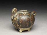 Brown glazed rabbit lime-pot (EA1969.3)