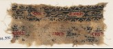 Textile fragment with bands of hexagonal cartouches, S-shapes, diamond-shapes, and crescents (EA1984.331)
