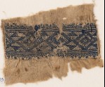 Textile fragment with linked diamond-shapes, triangles, and flowers (EA1984.349)