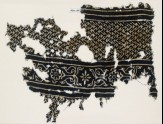 Textile fragment with linked chevrons and flowers, possibly from a garment (EA1990.136)