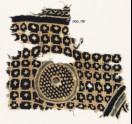 Textile fragment with grid, stars, and a circle with dots (EA1990.195)