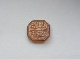 Octagonal bezel seal with nasta&lsquo;liq inscription, scroll, and floral decoration (LI1008.112)