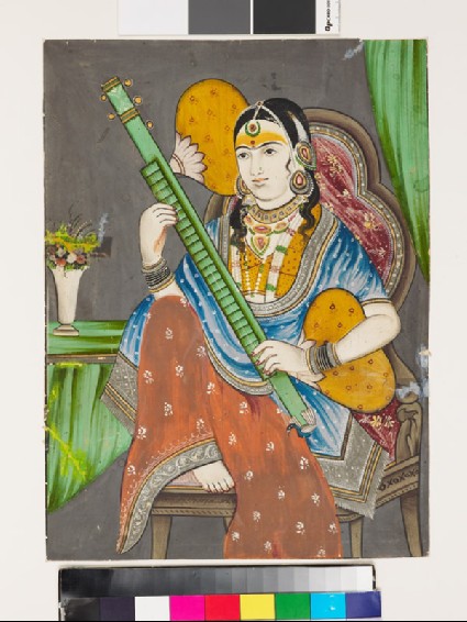 A lady playing a vinafront