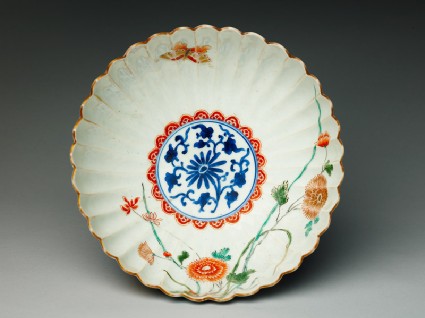 Fluted bowl with daisy, chrysanthemums, and orchidstop