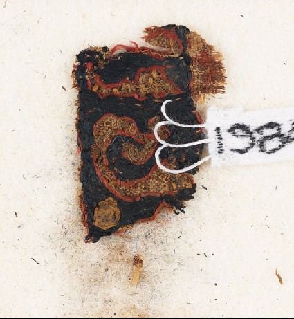 Textile fragment with inscriptionfront