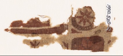Textile fragment with rosette in a circular framefront