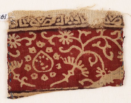 Pocket with ornate stems, tear-drop, and flowersfront