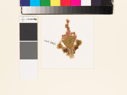 Textile fragment with pair of birds and a treefront