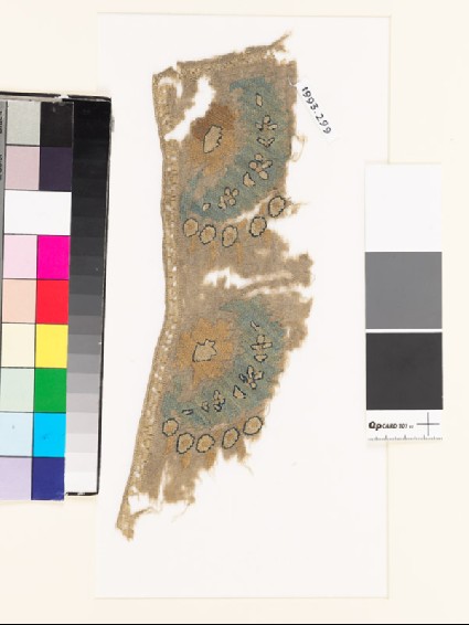 Textile fragment with stylized floral spraysfront