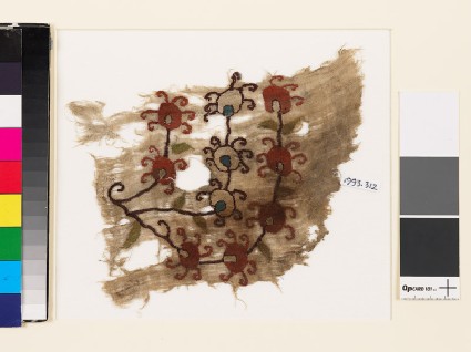 Textile fragment with stylized floral sprayfront