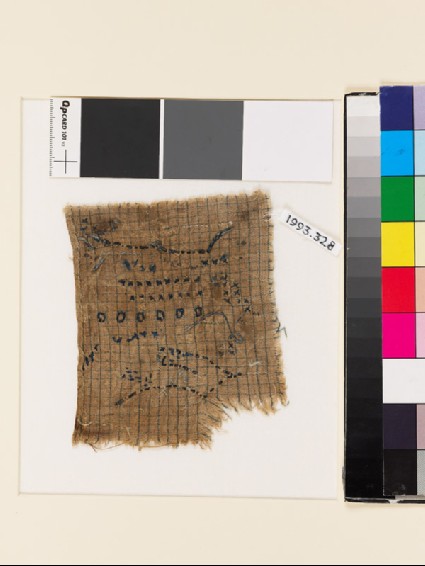 Textile fragment with lines and circlesfront