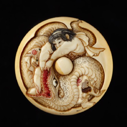 Manjū netsuke depicting Kintarō wrestling with a snakefront