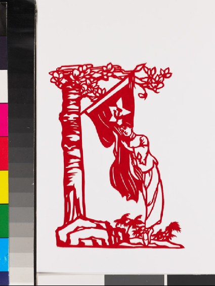 Heroine from the ballet Red Detachment of Women clutching a flagfront
