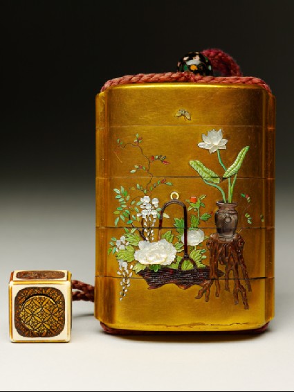 Inrō depicting the bodhisattva Fugen Bosatsu, and attached to a netsuke and ojimefront