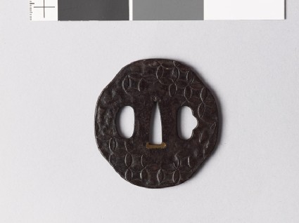 Octagonal tsuba with shippō diaper of interlaced circlesfront