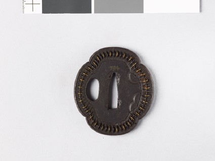 Mokkō-shaped tsuba with blossomsfront