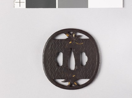 Tsuba with two maple leavesfront