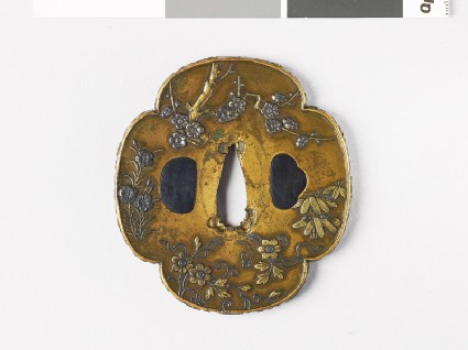 Mokkō-shaped tsuba with flowers and plantsfront