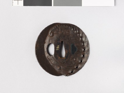 Tsuba in the form of awabi and clam shellsfront
