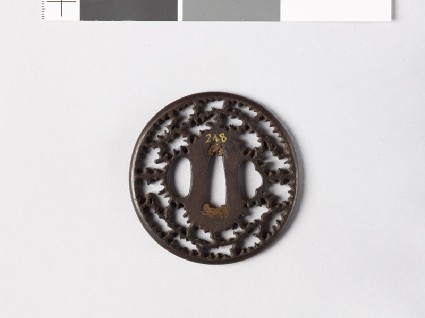 Round tsuba with cuspsfront
