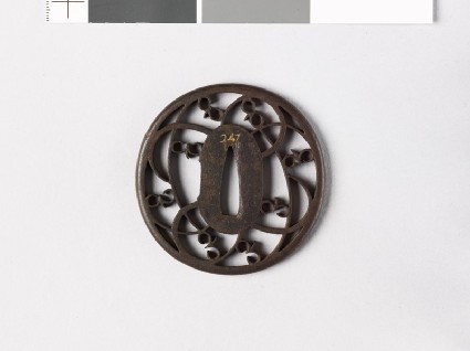 Round tsuba with grass and karigane, or flying geesefront
