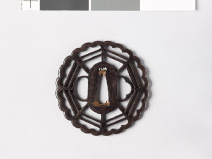 Tsuba with chrysanthemoid border enclosing a cobweb shapefront