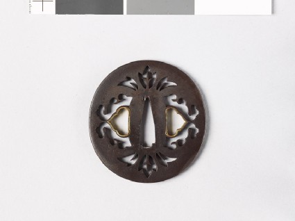 Tsuba with stylized flowersfront