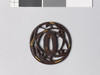 Tsuba with orchids and dewdropsfront