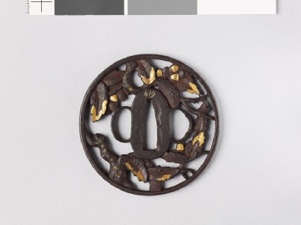 Round tsuba with oak branchesfront