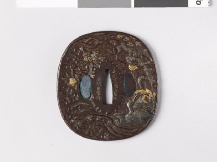 Tsuba depicting a swimming cranefront