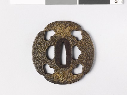 Mokkō-shaped tsuba with heart-shapes and karakusa, or scrolling plant patternfront