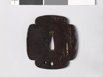 Mokkō-shaped tsuba with flowering plum branchfront