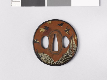 Tsuba depicting drying nets and birdsfront