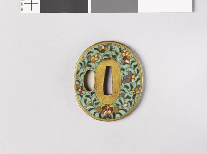 Tsuba with flowers and karakusa, or scrolling plant patternfront