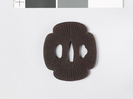 Mokkō-shaped tsuba with Amida-yasurime, or radial striationsfront