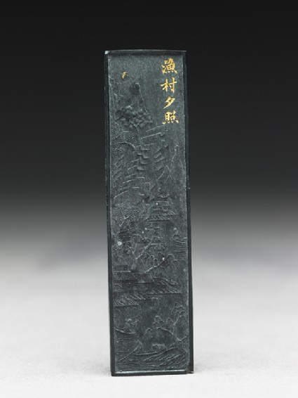 Ink stick with scene of river village at duskfront