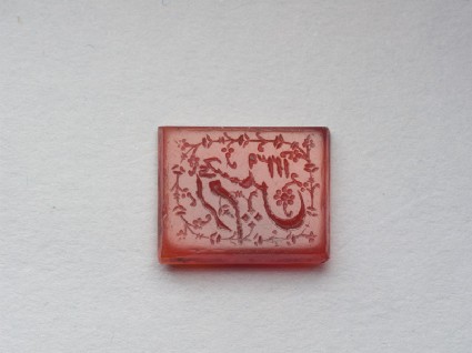 Rectangular bezel seal with nasta‘liq inscription and floral decorationfront