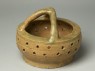 Greenware bowl with T-shaped handle (oblique)