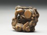 Netsuke in the form of Raiden, the god of thunder (side)
