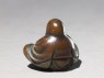 Netsuke in the form of Daruma meditating (side)