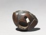 Netsuke in the form of Daruma meditating (bottom)