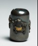 Ojime with oni, or demons (back)