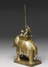 Toy soldier with elephant and driver (side)