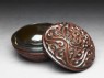 Lacquer box with scroll and floral decoration (oblique, open)