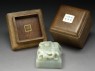 Jade seal surmounted by a pair of dragons (oblique, with box and lid)