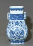 Blue-and-white vase with fruit and leaves (oblique)