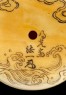 Manjū netsuke depicting the Daoist immortal Bashikō performing acupuncture on a dragon (detail)
