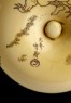 Manjū netsuke depicting Minamoto Yoshitsune practising martial arts with a tengu demon (detail)