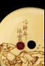 Manjū netsuke depicting a boy throwing beans at the Setsubun festival (detail)